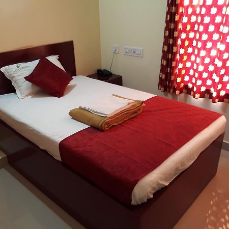 Hotel Ganga Residency Kuzhittura Bagian luar foto