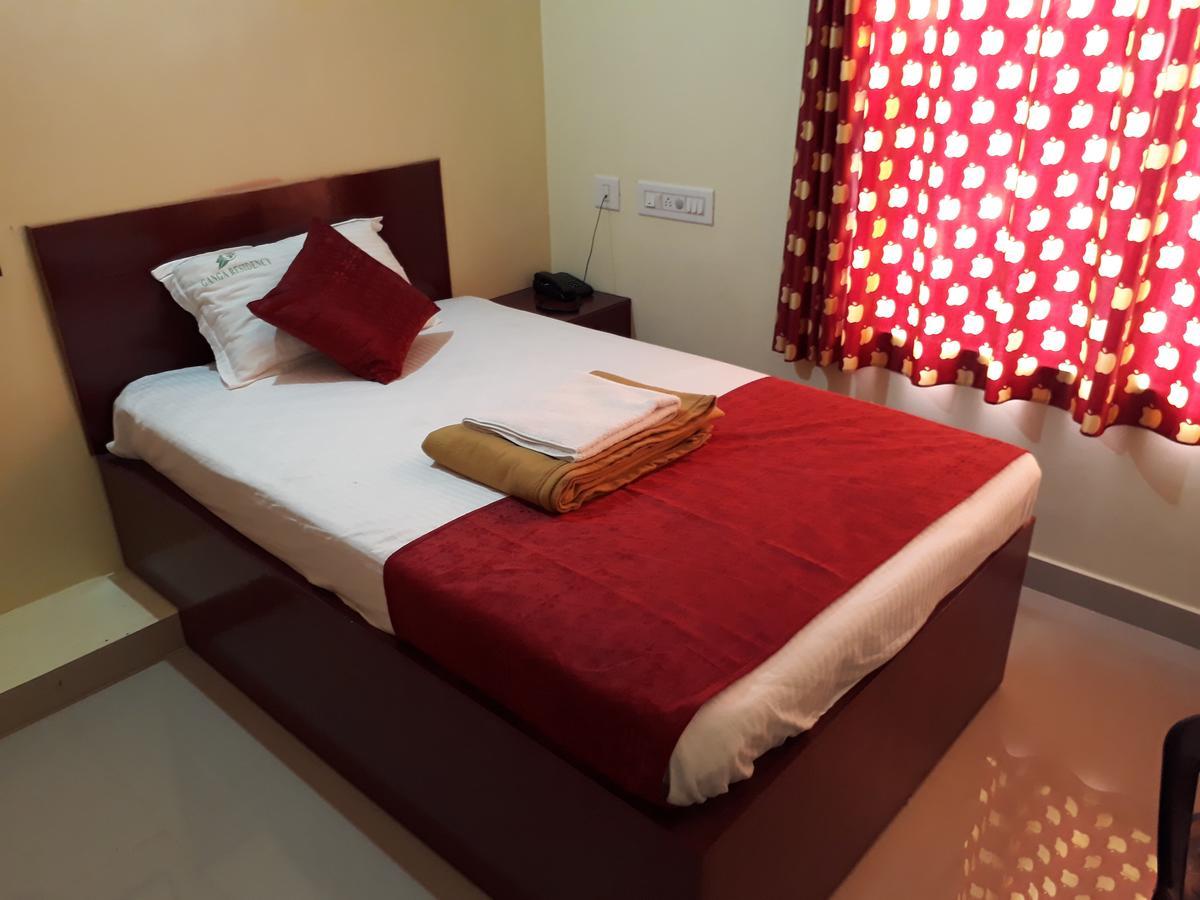 Hotel Ganga Residency Kuzhittura Bagian luar foto