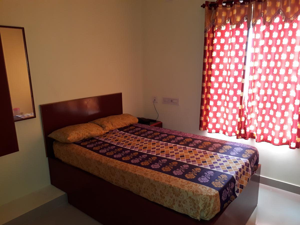 Hotel Ganga Residency Kuzhittura Bagian luar foto